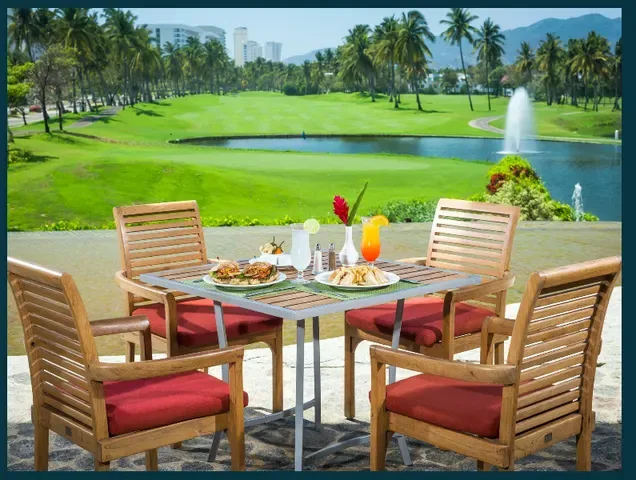 Resort dining terrace in a lush Mexican setting