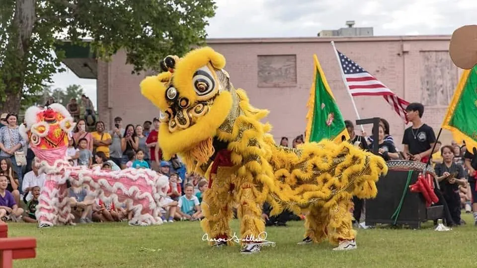 Lion dancers performing for a community audience