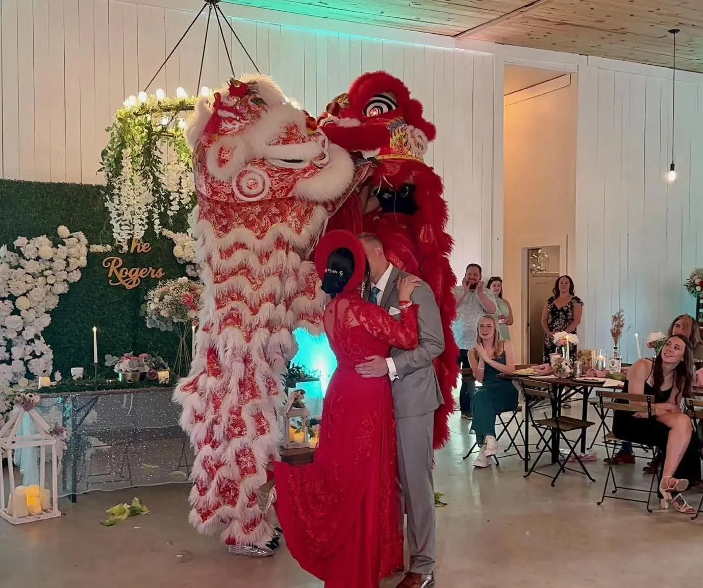 Hung Viet lion dancers performing at a wedding celebration