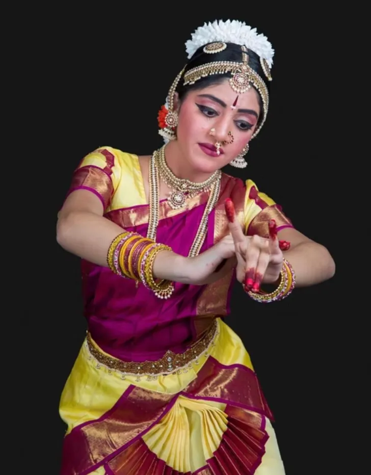 Sainrithya dancer performing in a traditional costume